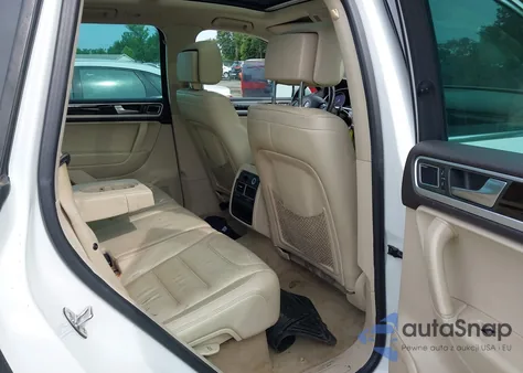 2014 Volkswagen Touareg Tdi Executive z USA, uszkodzony, nr VIN WVGEP9BP7ED001268